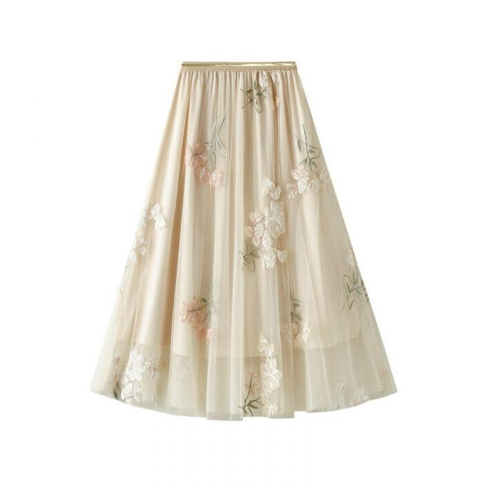 Elegant layered tulle midi skirt with floral embroidery, perfect for summer outings and stylish outfits.