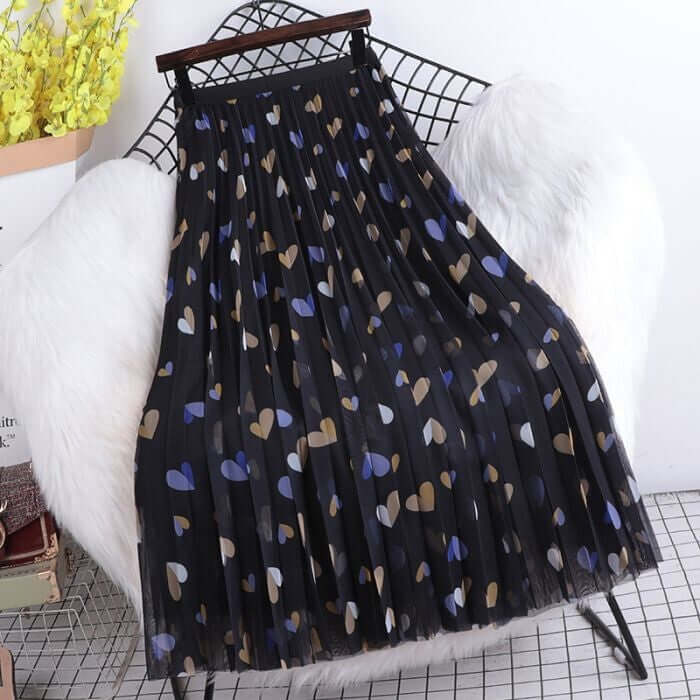 Hearts pattern pleated midi skirt in black with colorful heart prints, stylish and comfortable for women's fashion.