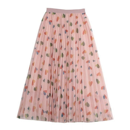 Pleated midi skirt featuring colorful hearts pattern, stylishly designed for comfort and elegance, perfect for romantic occasions.