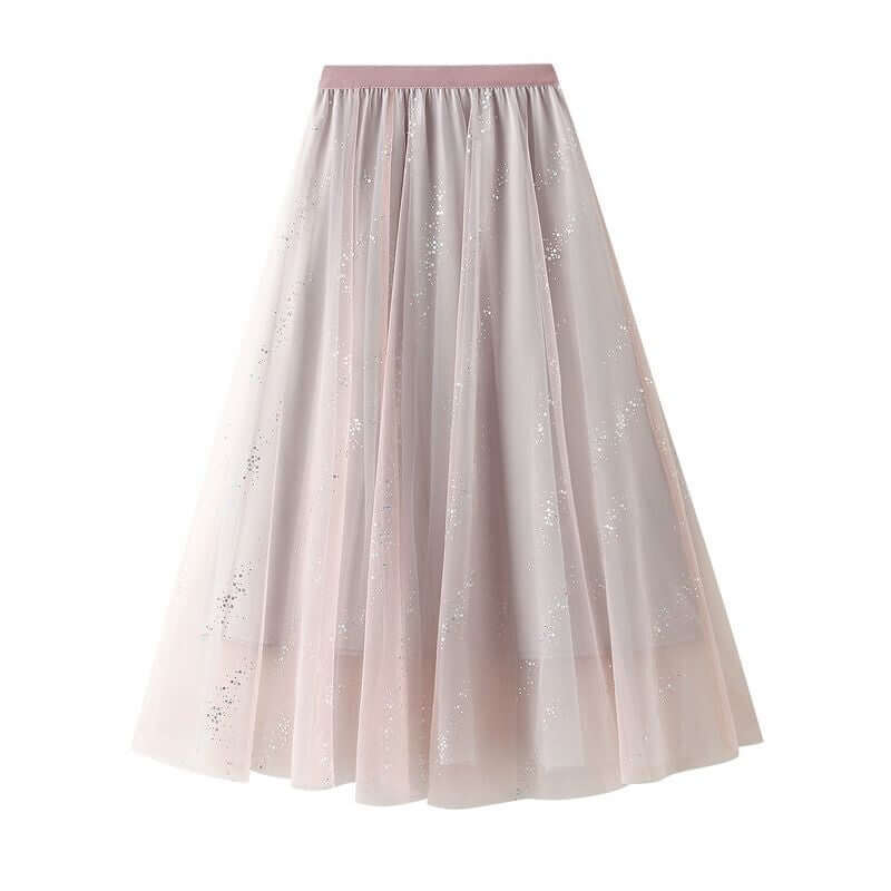 Elegant layered pink tulle maxi skirt with soft layers for a romantic summer look.
