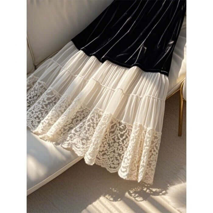 Elegant black and cream women's skirt featuring velvet and lace layers, perfect for stylish and chic outfits.