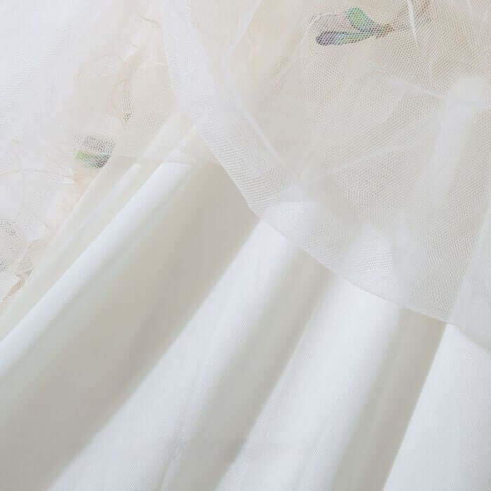 Elegant layered pink tulle maxi skirt showcasing soft tulle and smooth fabric, perfect for summer fashion.