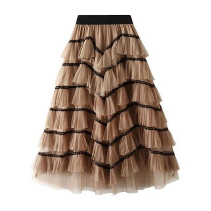 Elegant layered beige tulle midi skirt with black lace trim, perfect for stylish summer outfits.